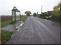 Bus stop and shelter on Marsh Road in PE34 4LQ
