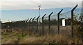 The boundary fence at Wharton Aerodrome in PR4 1EH
