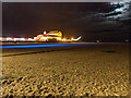 Britannia Pier and beach at night in NR30 2DG
