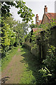 Path lying between churchyard and Suddern Farm House, Over Wallop in Over Wallop