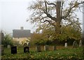 Little Gransden churchyard in autumn in SG19 3DY