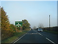 A59 nears B6161 roundabout in HG3 2WW