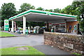 Bridge parapet, BP petrol station and Spar shop, Wigton Road in CA2 6HJ