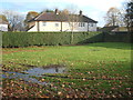 Green and houses, Stainton Grove in DL12 8UJ
