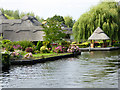 Thatched Housing on the River Bure at Wroxham in NR12 8JE