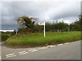 Signpost at Dainton Elms Cross in TQ12 5TB