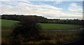 Farmland alongside the East Coast main railway line heading North in DL1 3NE