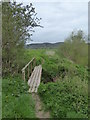 Footbridge over a ditch running into the River Wye near Hollington Farm in HR2 6LX