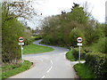 Junction of minor road with the B4399 at Holme Lacy in HR2 6LJ