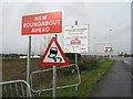 Road signs on the A6 in MK40 2EJ