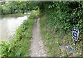 Milepost along the Grand Union Canal towpath in NN7 3PH