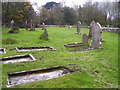 Carew Cheriton Church - some sunken type graves in SA70 8SR