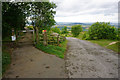 Path and road on Crickley Hill in GL3 4UQ