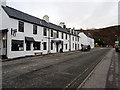Seafront houses and shops at Ullapool in IV26 2SX
