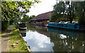 Narrowboats moored along the Grand Union Canal in MK6 3DQ