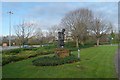 Sculpture and car park in Creekmoor Ward