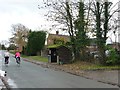 Cyclists passing Haunton's bus shelter in B79 9HL