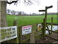 Warning signs at footpath stile in RH14 9BP