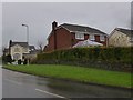Houses at the end of Holtwood Drive, seen from Cornwood Road in PL21 9TX