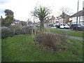 Landscaped grass triangle by Charlton Road in HA7 1LP