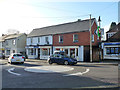 Mini roundabout and shops, Liphook in GU30 7EU