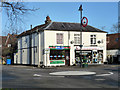 Mini roundabout and shops, Liphook in GU30 7AH