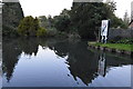 Channel of the River Kennet leaves the canal in RG14 2PB