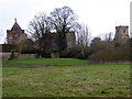 Medieval kitchen, Pope's Tower and St. Michael's Church from Steady's Lane in OX29 5BP