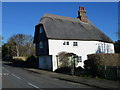 Three storey thatched cottage in Landbeach in Landbeach
