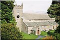 Hawkshead: parish church; hills beyond in LA22 0NN