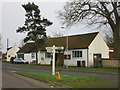 Signpost and Flixborough Village Hall in DN15 8RL
