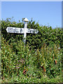 Signpost west of Philham, Devon in EX39 6EZ