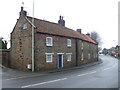 Stone houses on Main Street, Cayton in YO11 3SN