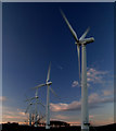 Wind turbines against winter sunset in S36 9NH