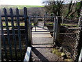 Level crossing gate west of Quakers Yard railway station in CF46 5PQ