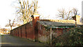 Old brick wall at St Andrew's hospital in NR13 5GS
