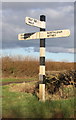 Signpost at crossroads near Common Leys Farm in OX29 9UY