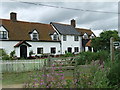 Cottage And Footpath Sign in IP11 0SE