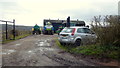 Farm building and vehicles in NP18 1LZ