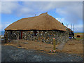 Thatching a new building at the Skye Museum of Island Life in IV51 9YU