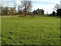 Lowesby Hall across the outfield of the cricket ground in LE7 9DD