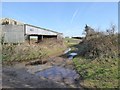 Field entrance and barn at Colliver Cross in EX9 7HZ