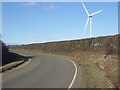 Road bend and wind turbine, Stormy Down in CF33 4RR