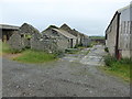 Old farm buildings at Penial Dowyn in LL65 4YE