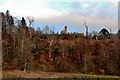 Knock Castle perched above wooded coastal slopes in PA17 5HE