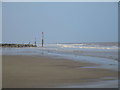 Markers at the end of groynes, Hornsea in HU18 1TH