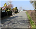 Warning sign - give way 60 yards ahead, north of Kilpeck, Herefordshire in HR2 9DF