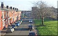 Straight street and terraced houses in M12 4GQ
