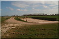 Farm's hard standing by the footpath along the inner sea bank an North Coates in North Cotes