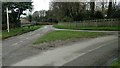 Road junction and grass triangle in LE16 7SB
